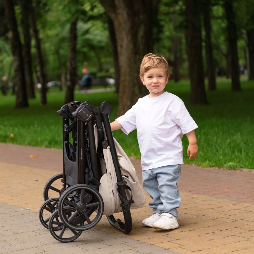 Carrello Bravo Lite CRL-5529 - wózek spacerowy całoroczny, spacerówka z dużymi kołami, z lampką LED, teleskopowa regulacja rączki, łatwe składanie • Bamboo Green