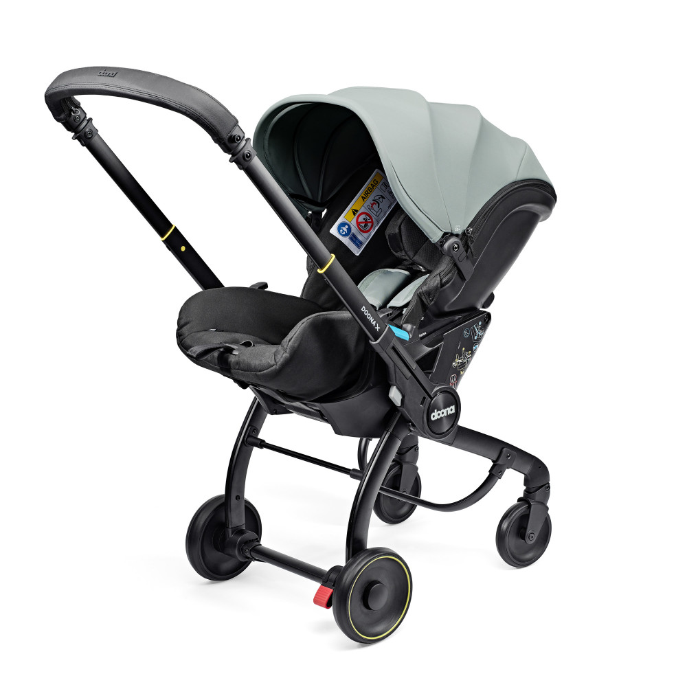 Doona X - mobilny fotelik samochodowy, wózek dla dziecka (0-13kg, 40-85cm) • Dusty Sage
